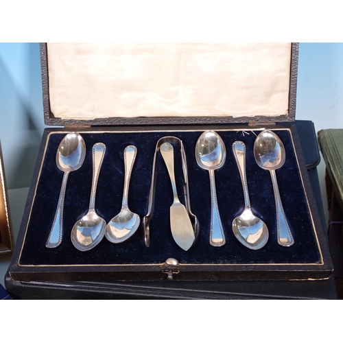 466 - A set of six silver Teaspoons and matching Sugar Tongs in case, a set of Super Zenith Binoculars in ... 