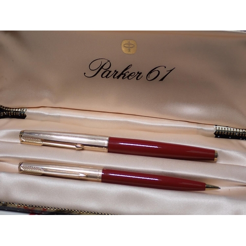 469 - A Parker 61 Pen and Pencil Set in case, and a Parker Fountain Pen in case