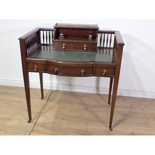 48 - A reproduction mahogany Writing Desk with fitted inkwells and raised gallery back 3ft 1in W x 3ft 1i... 