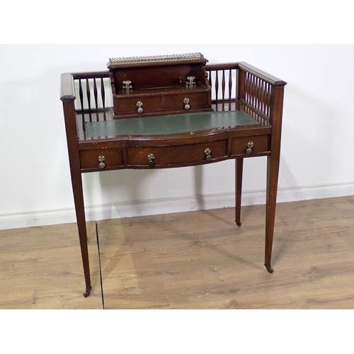 48 - A reproduction mahogany Writing Desk with fitted inkwells and raised gallery back 3ft 1in W x 3ft 1i... 