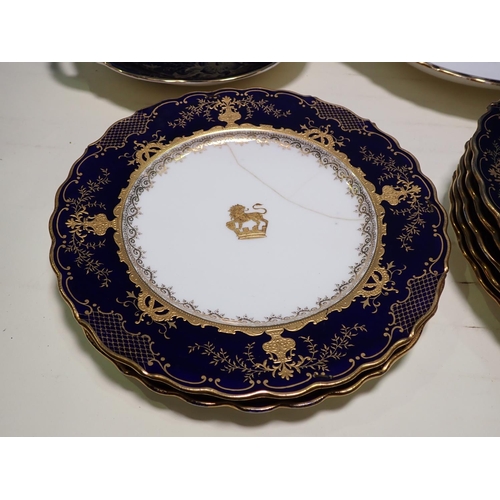 494 - A Coalport 11 piece Dessert Service, each piece with central gilt crest and profusely gilt borders o... 