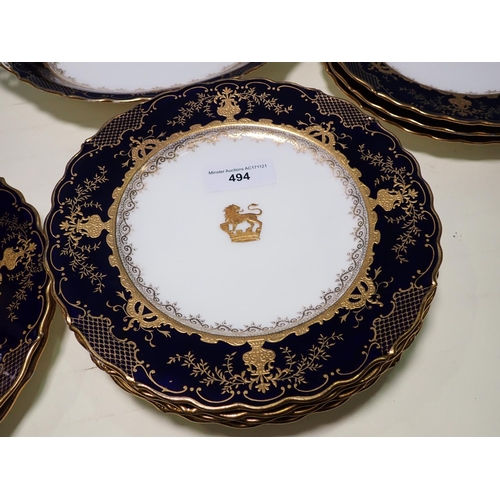 494 - A Coalport 11 piece Dessert Service, each piece with central gilt crest and profusely gilt borders o... 