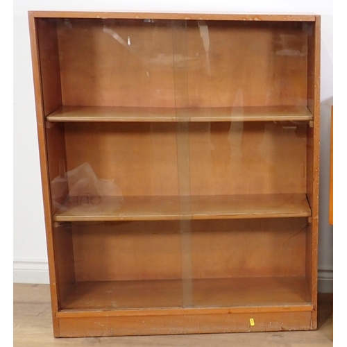 516 - Two modern Bookcases with sliding glass doors