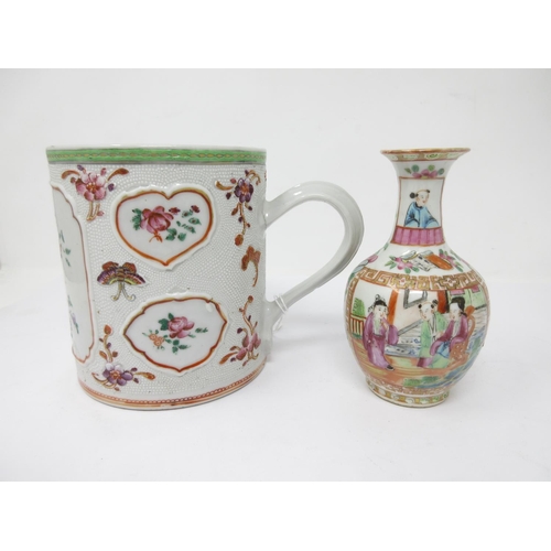 52 - A Chinese export Mug moulded and painted butterflies and flowers in famille rose enamels, 5in, and a... 