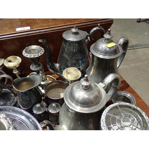 522 - A quantity of plated ware including Coffee Pots, Trays, Candelabra, etc.