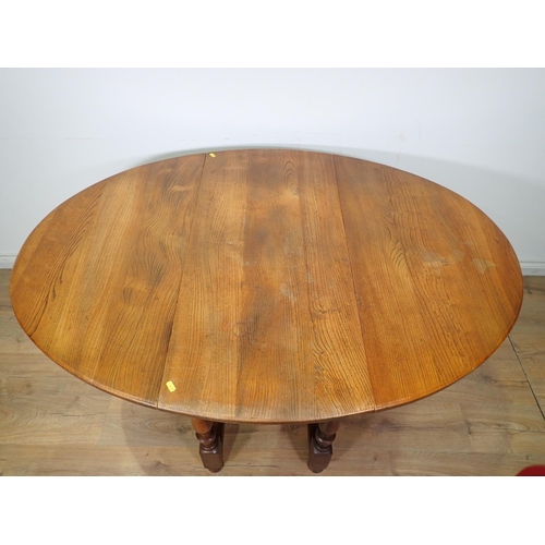 536 - An oak Gateleg Dining Table on turned supports 3ft 2in x 2ft 5in