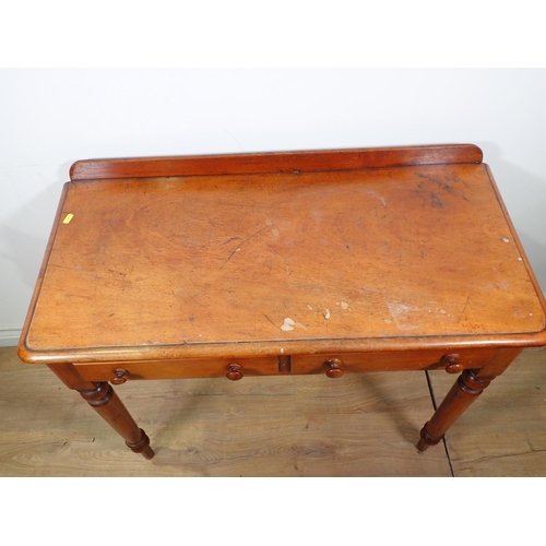 593 - A Victorian mahogany Side Table fitted two frieze drawers mounted upon turned supports 2ft 11in x 2f... 