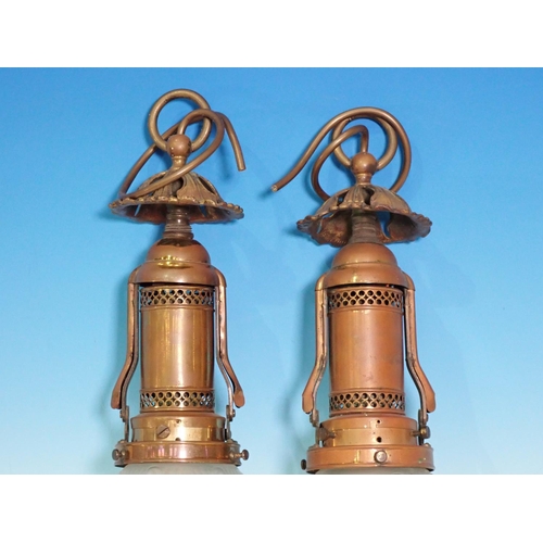 60 - A pair of brass Wall Lights with opaque glass torch shades 1ft 5in