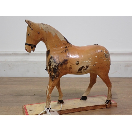 601A - A carved and painted folk art model Horse 8in