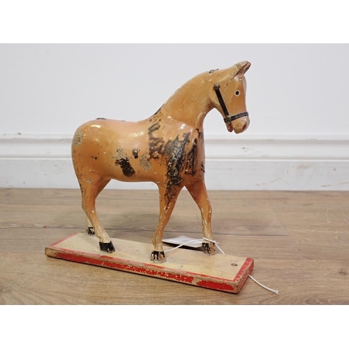 601A - A carved and painted folk art model Horse 8in