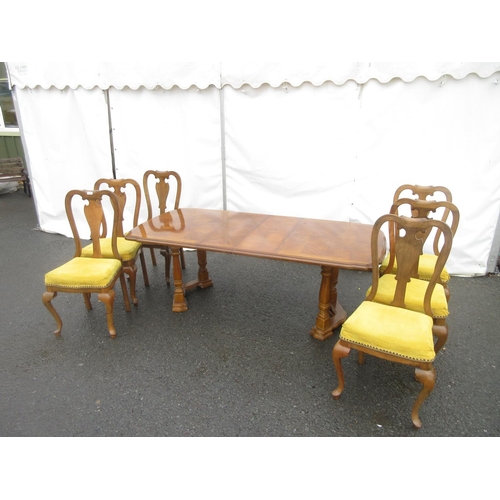 636 - A modern oak veneered extending Dining Table and six walnut Dining Chairs with yellow stuff over sea... 