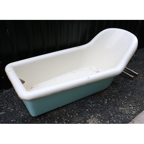 648 - A fibreglass Bath on brass paw feet with gilt swan Taps 5ft 8in x 2ft 8in