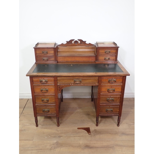 75 - A Victorian walnut Writing Desk with raised back of drawers by James Shoolbred & Co. 3ft 9in x 3ft 3... 