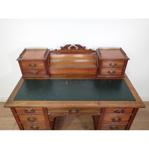 75 - A Victorian walnut Writing Desk with raised back of drawers by James Shoolbred & Co. 3ft 9in x 3ft 3... 