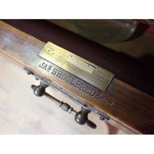 75 - A Victorian walnut Writing Desk with raised back of drawers by James Shoolbred & Co. 3ft 9in x 3ft 3... 