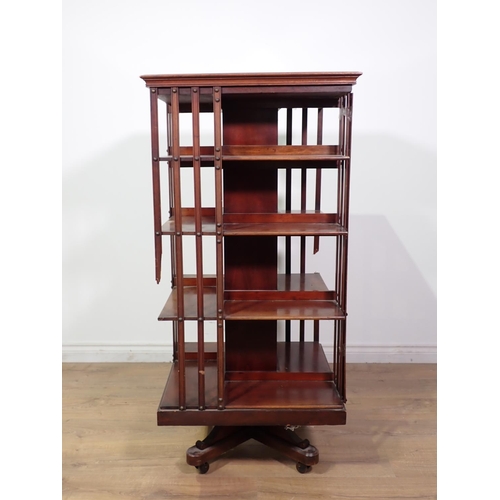 83 - An Edwardian mahogany revolving Bookcase 4ft 2in H x 2ft W A/F