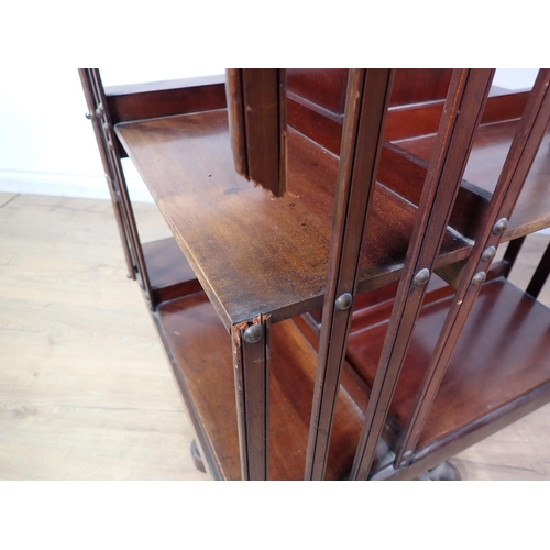 83 - An Edwardian mahogany revolving Bookcase 4ft 2in H x 2ft W A/F