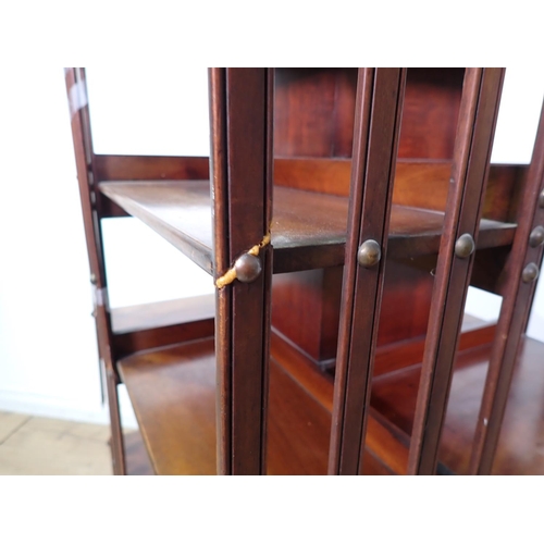 83 - An Edwardian mahogany revolving Bookcase 4ft 2in H x 2ft W A/F