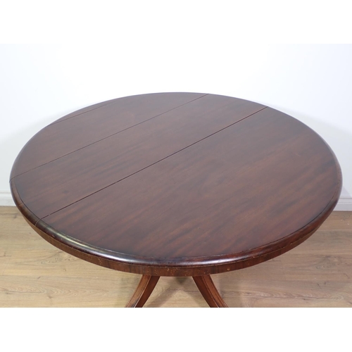 87 - A 19th Century mahogany Breakfast Table with brass paw toe caps and casters 3ft 11in D x 2ft 6in H