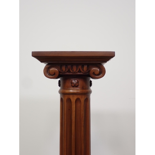 92 - A mahogany Torchiere 2ft 11 1/2in x 10in