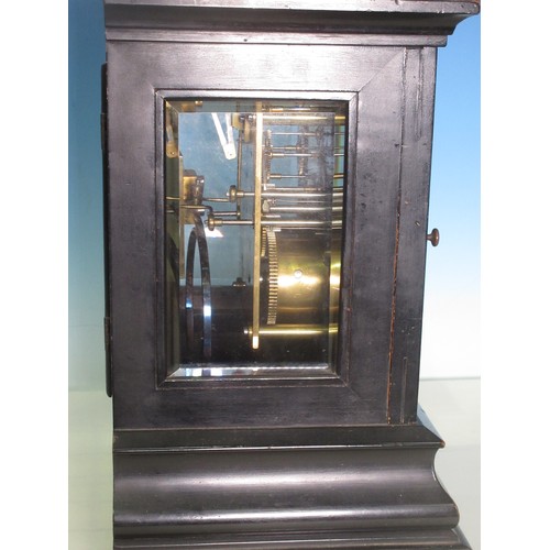 442 - A 19th Century ebonised Bracket Clock with brass style silver chapter ring and stepped base, 12in H