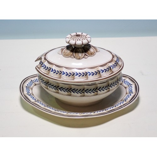 49 - An 18th Century Wedgwood creamware Sauce Tureen and Cover with blue and sepia leafage frieze, 7in, i... 