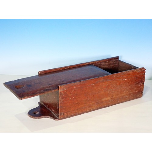 449 - An antique oak Candle Box with sliding cover, 16in