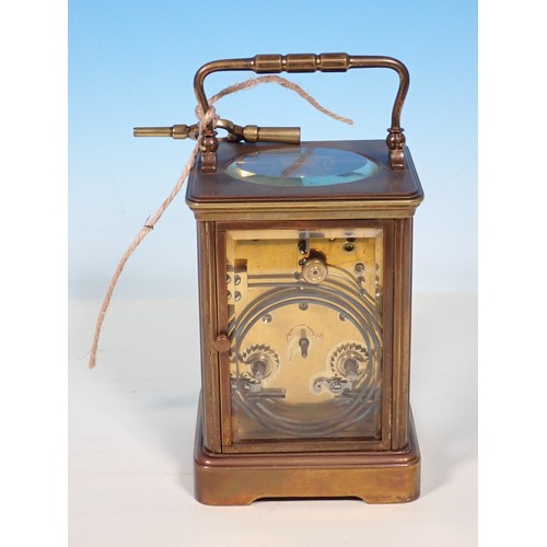 463 - A large brass Carriage Clock with white enamel dial, 5 1/4in H