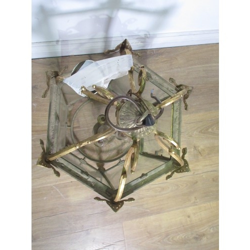 448 - A gilt metal hexagonal Hall Lantern with scroll design and glass panels, 2ft H