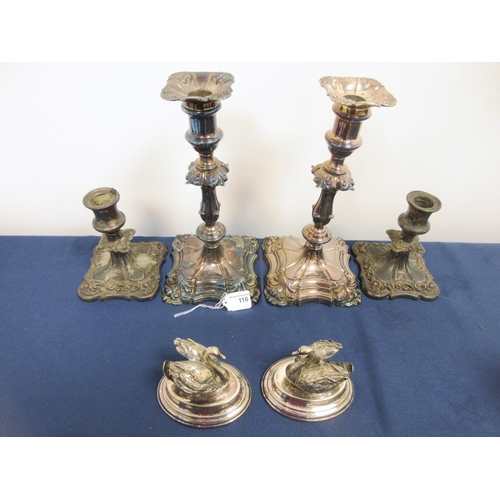 116 - A pair of plated Pillar Candlesticks on shaped square bases, 10in, a smaller pair of Candlesticks, a... 