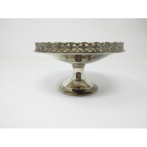 119 - A George V silver Tazza with leafage pierced gallery and beaded rims, London 1926, 225 gms