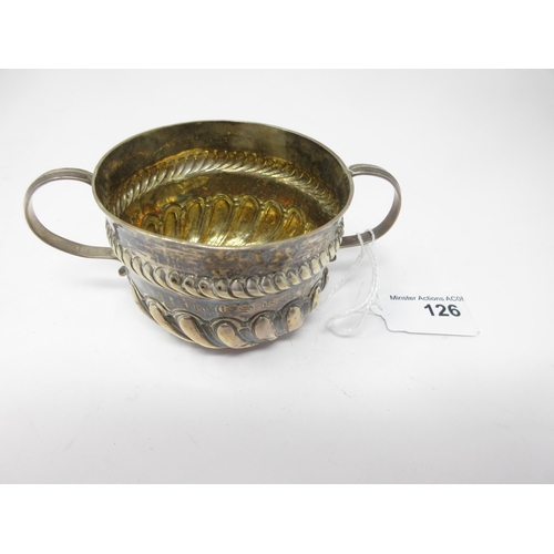 126 - An early silver small two handled Porringer with gadroon embossing, engraved initials, S.D. to C.S. ... 