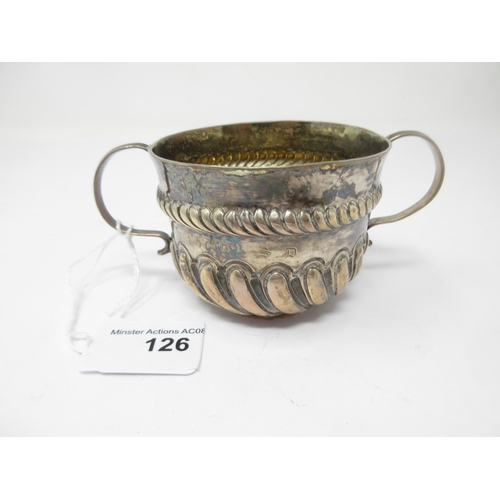 126 - An early silver small two handled Porringer with gadroon embossing, engraved initials, S.D. to C.S. ... 