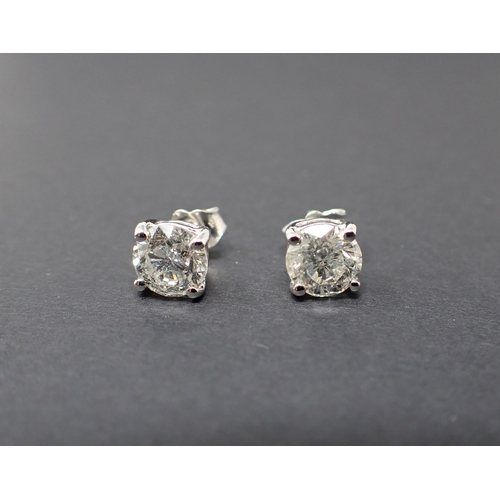 173 - A pair of Diamond Ear Studs claw-set brilliant-cut stones in 18ct white gold, total diamond weight 2... 