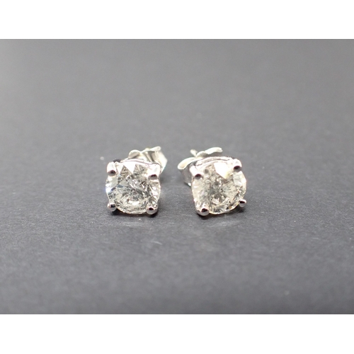 173 - A pair of Diamond Ear Studs claw-set brilliant-cut stones in 18ct white gold, total diamond weight 2... 