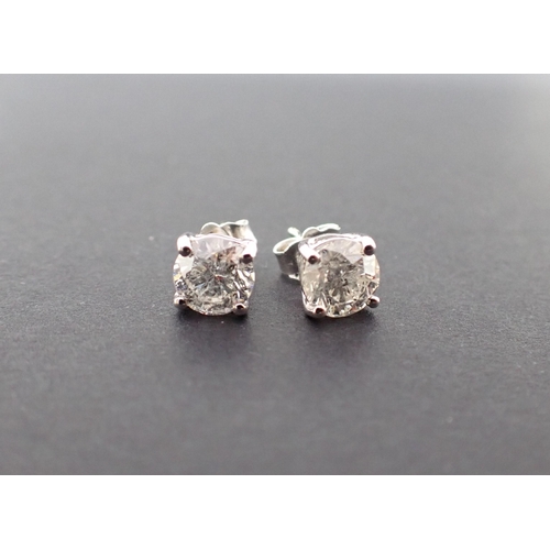 173 - A pair of Diamond Ear Studs claw-set brilliant-cut stones in 18ct white gold, total diamond weight 2... 