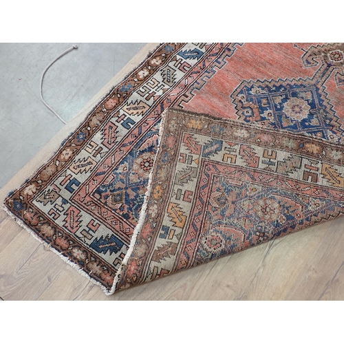 19 - An old Persian Rug 5ft 8in x 3ft 10in