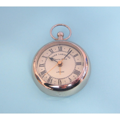 211 - A Roger Lascelles quartz Travel Alarm Clock in the form of a pocket watch in silver plated case