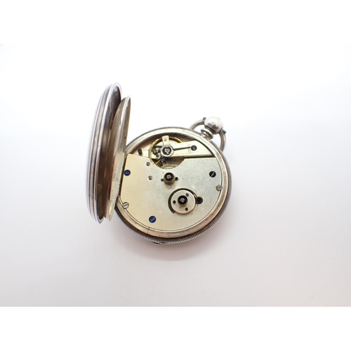 252 - A silver cased half-hunter Pocket Watch the white enamel dial with roman numerals and subsidiary dia... 