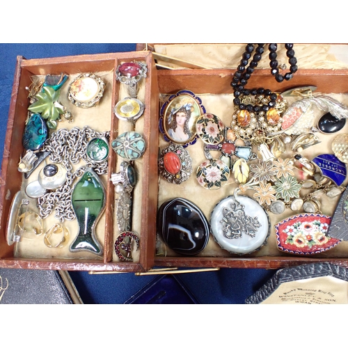 273 - An old Jewel Box containing Costume Jewellery, a part set of enamelled Dress Studs, an old school Ba... 