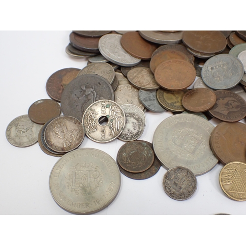 412 - A box of assorted British and World coins, to include an 1892 Crown, Australian 1914 Florin, minor s... 