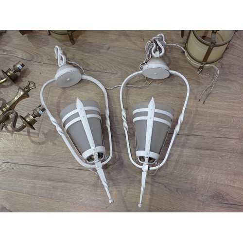 474 - Two ceiling Electroliers, two white painted Lanterns and a pair of brass two branch Wall Lights