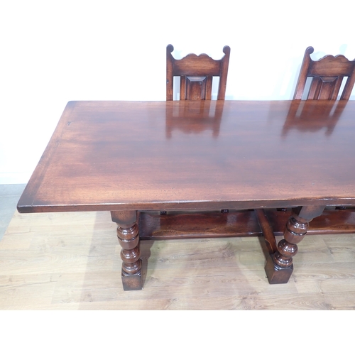 480 - A 17th Century style oak Refectory Table with cleated top mounted upon six turned supports with thic... 