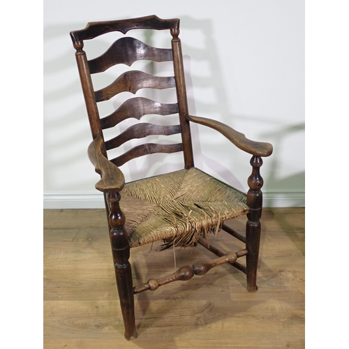 496 - Three antique rush seated Elbow Chairs, another with replacement solid seat and a single Chair