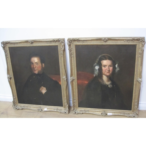 523 - ENGLISH SCHOOL, circa 1850. Portrait of a Gentleman; and Portrait of a Lady, half-length, oil on can... 