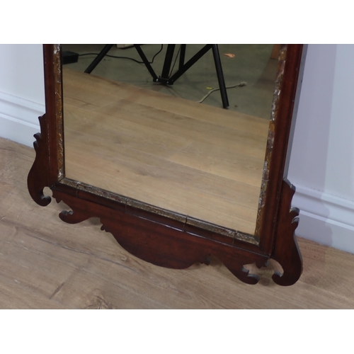 568 - A Georgian style mahogany Wall Mirror with scrolled fret carved frame, and gilt slip, 2ft 9in H x 1f... 