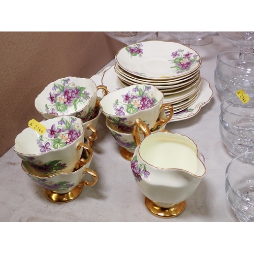 597 - A Frank Buckley part Tea Set decorated floral sprays with gilt detail, a Grafton China part Tea Set,... 