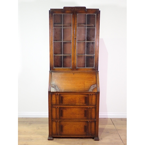 6 - An oak and lead glazed Bureau Bookcase 6ft 8in x 2ft 6in