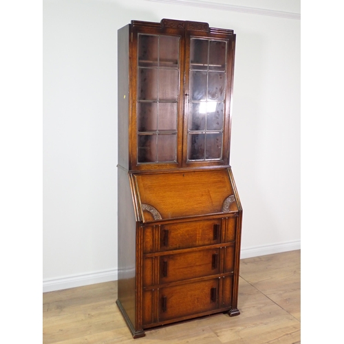 6 - An oak and lead glazed Bureau Bookcase 6ft 8in x 2ft 6in