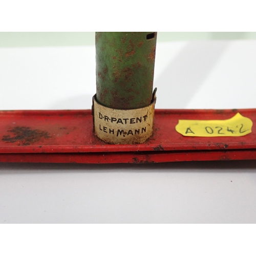 644 - A Lehmann tin plate Toy, a pole climber, 15in H